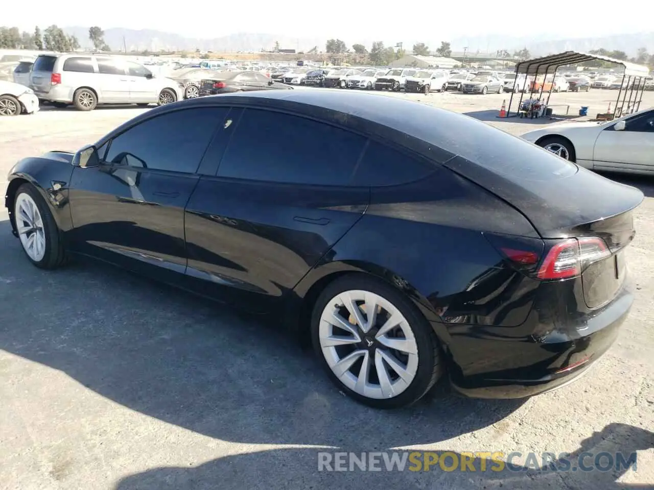 2 Photograph of a damaged car 5YJ3E1EB4MF879556 TESLA MODEL 3 2021