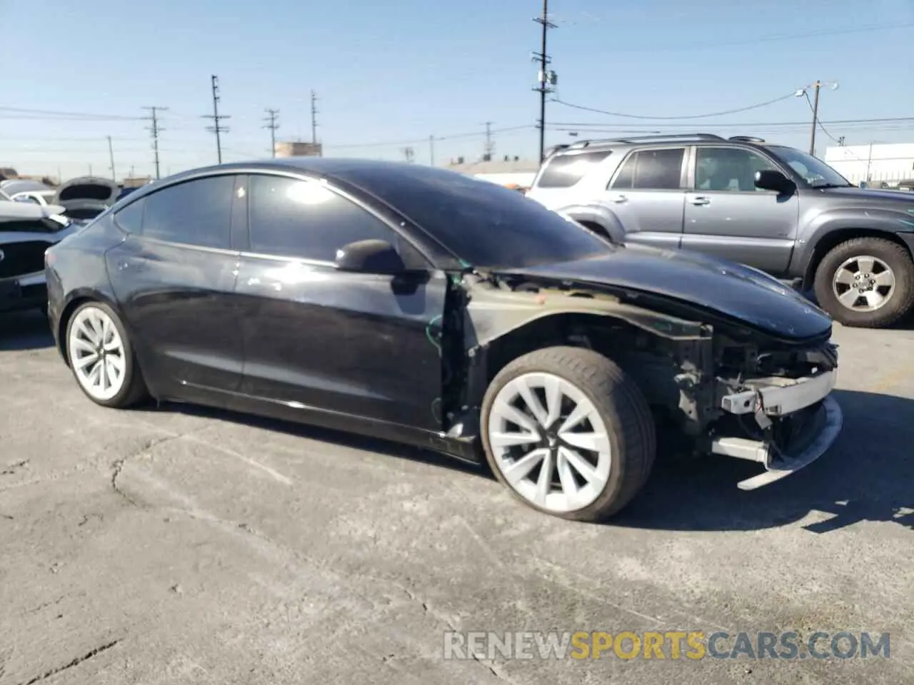 4 Photograph of a damaged car 5YJ3E1EB4MF879556 TESLA MODEL 3 2021