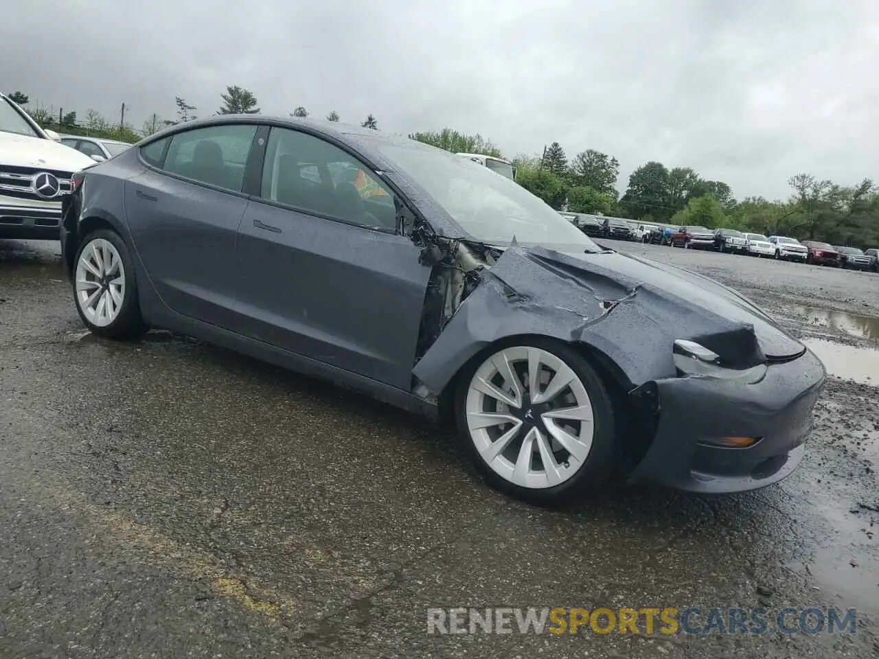 4 Photograph of a damaged car 5YJ3E1EB4MF902690 TESLA MODEL 3 2021