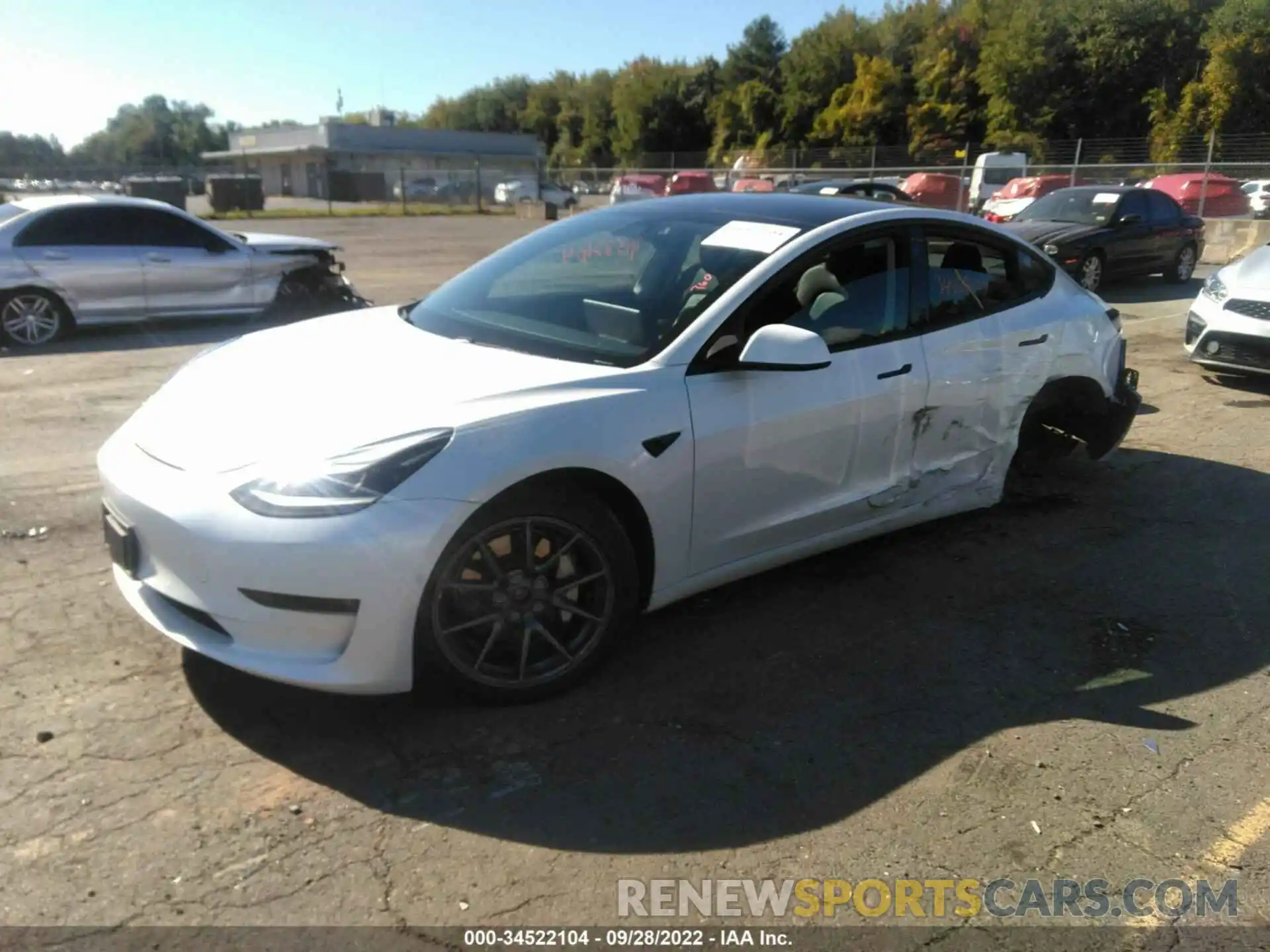 2 Photograph of a damaged car 5YJ3E1EB4MF915441 TESLA MODEL 3 2021