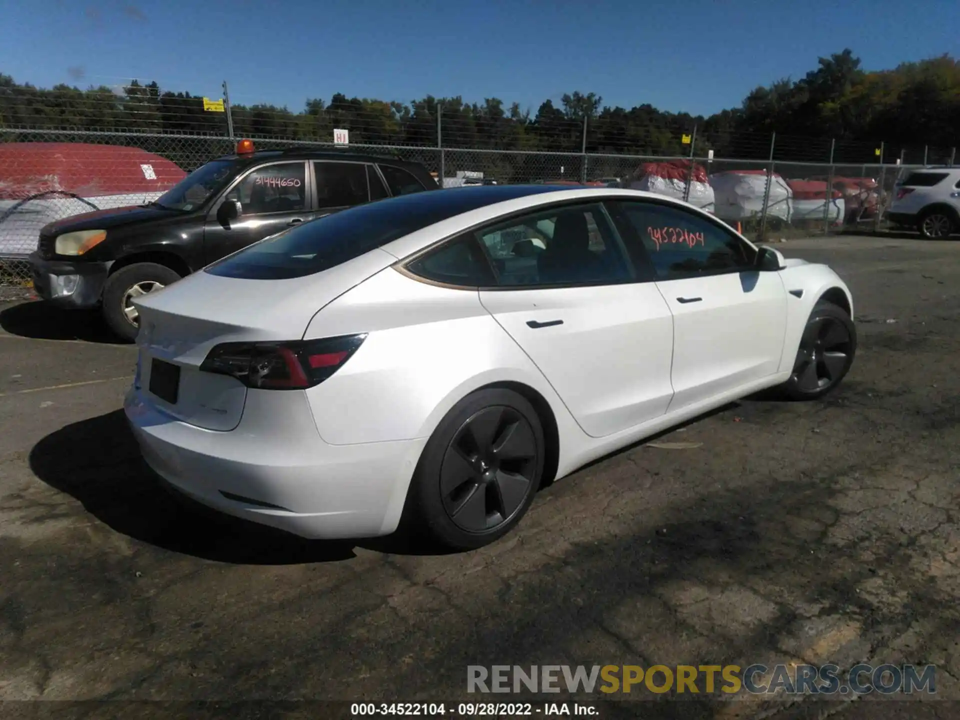 4 Photograph of a damaged car 5YJ3E1EB4MF915441 TESLA MODEL 3 2021