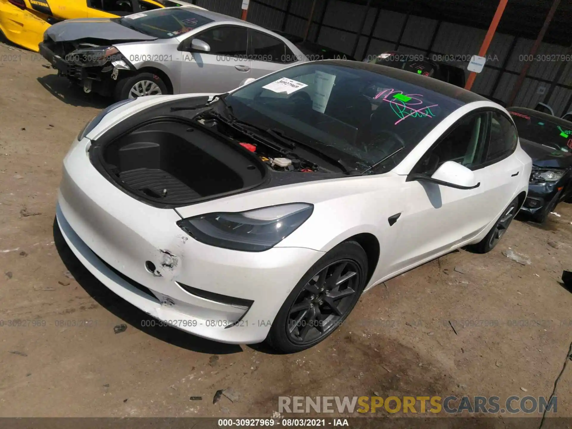 2 Photograph of a damaged car 5YJ3E1EB4MF928321 TESLA MODEL 3 2021