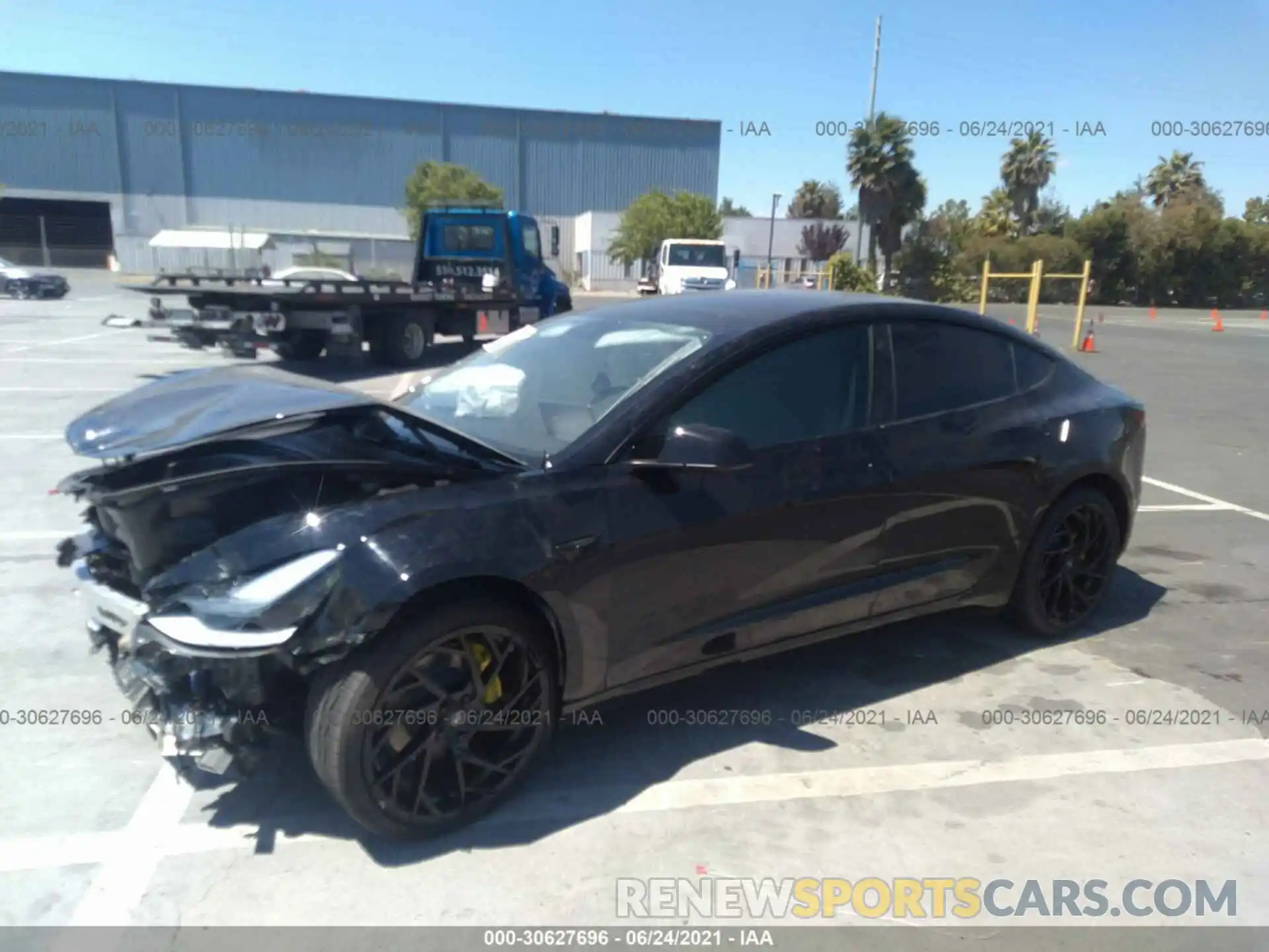 2 Photograph of a damaged car 5YJ3E1EB4MF935995 TESLA MODEL 3 2021