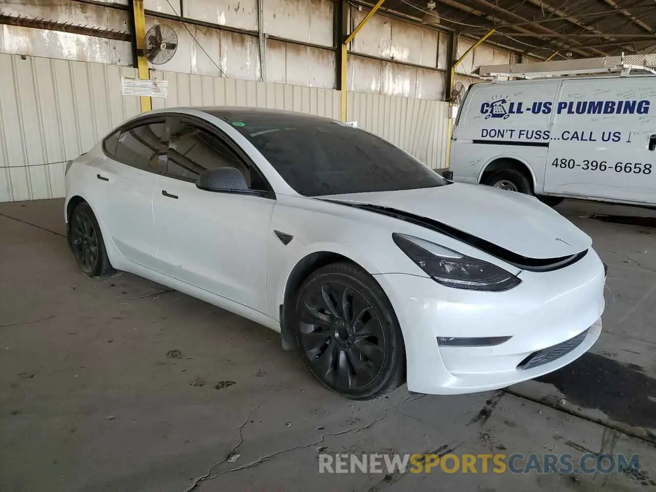 4 Photograph of a damaged car 5YJ3E1EB4MF938427 TESLA MODEL 3 2021