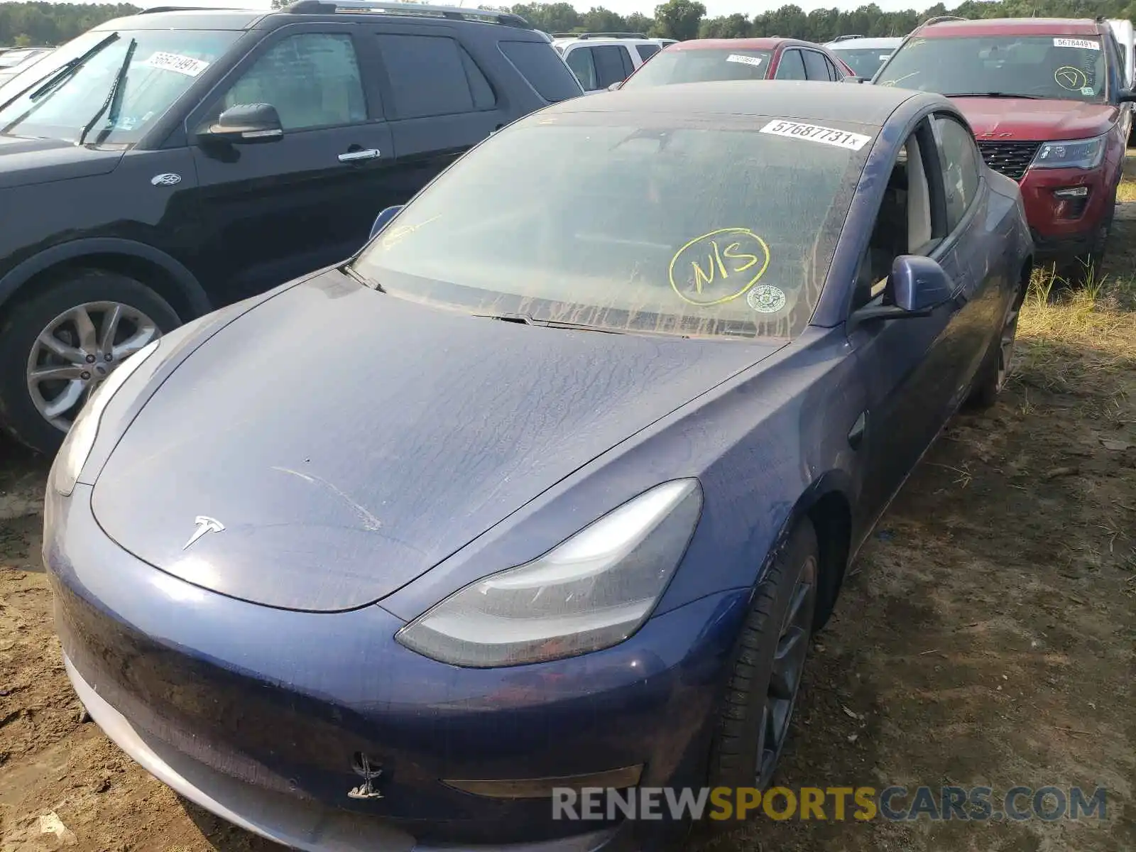 2 Photograph of a damaged car 5YJ3E1EB4MF992701 TESLA MODEL 3 2021