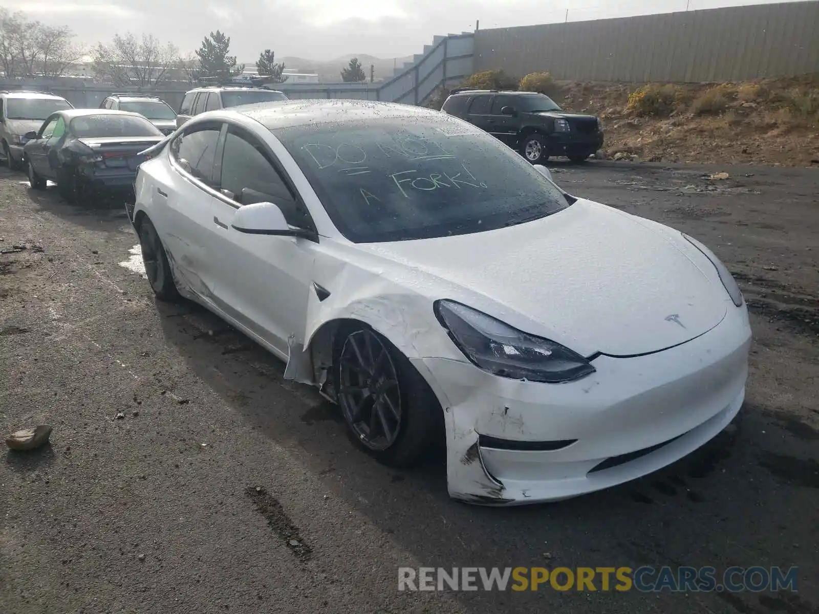 1 Photograph of a damaged car 5YJ3E1EB4MF999079 TESLA MODEL 3 2021