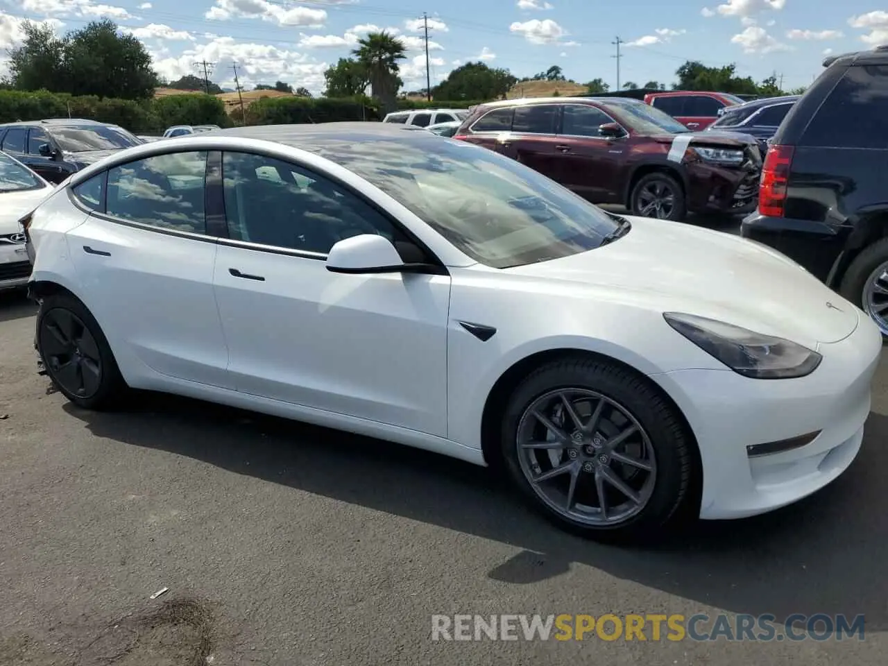 4 Photograph of a damaged car 5YJ3E1EB5MF004003 TESLA MODEL 3 2021