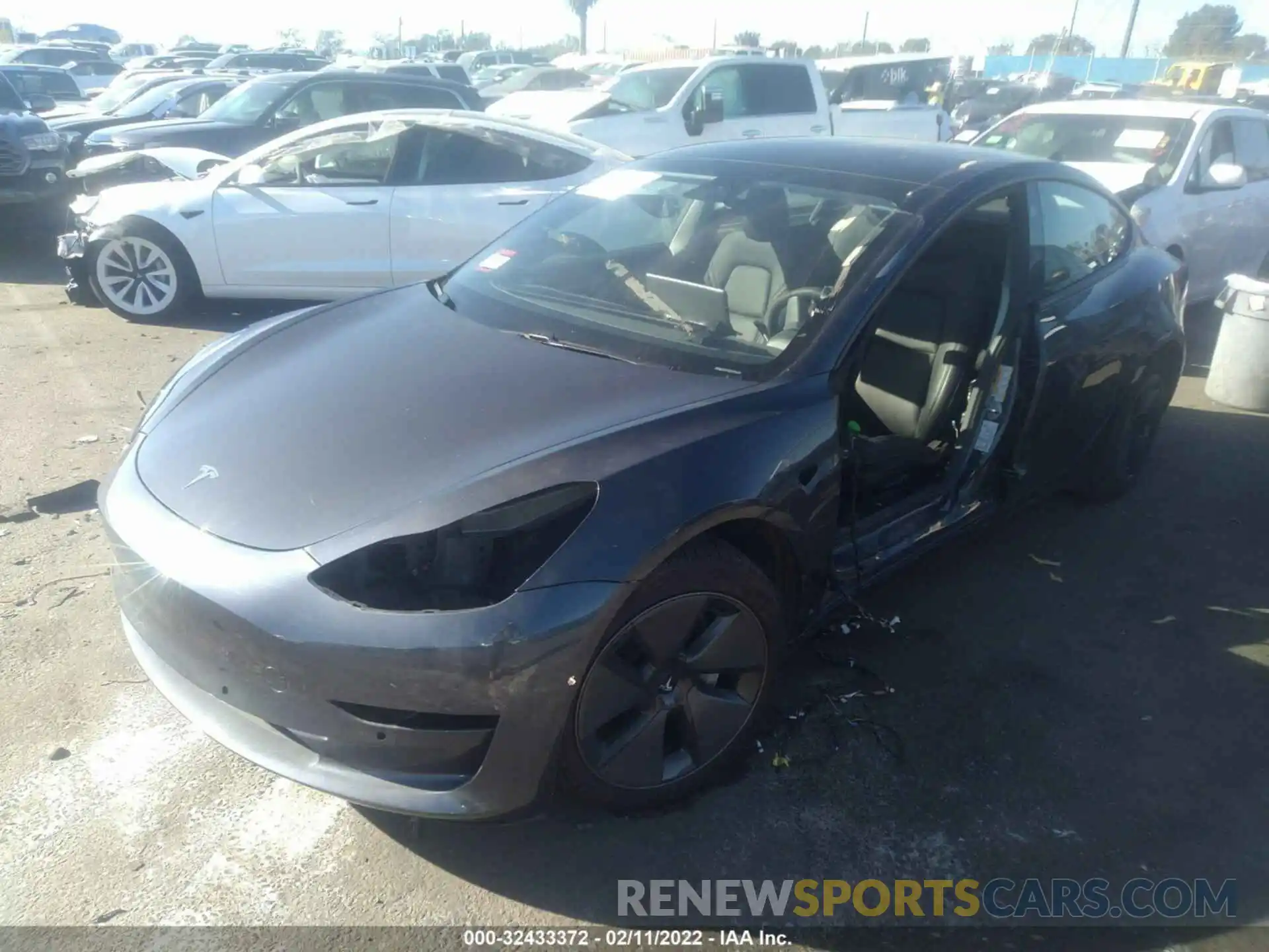 2 Photograph of a damaged car 5YJ3E1EB5MF006799 TESLA MODEL 3 2021