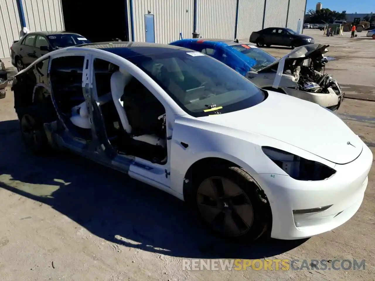 4 Photograph of a damaged car 5YJ3E1EB5MF054657 TESLA MODEL 3 2021