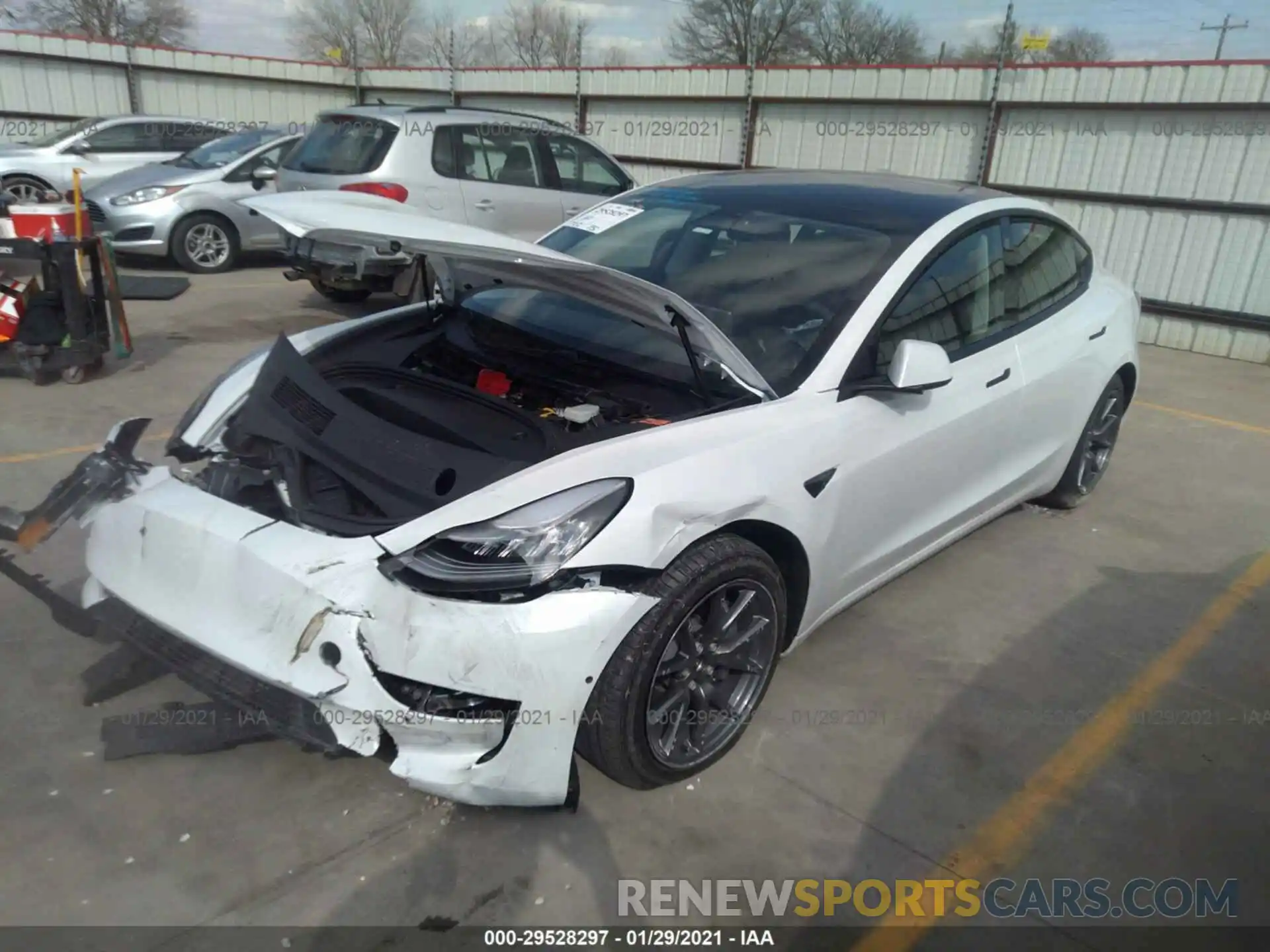 2 Photograph of a damaged car 5YJ3E1EB5MF852883 TESLA MODEL 3 2021