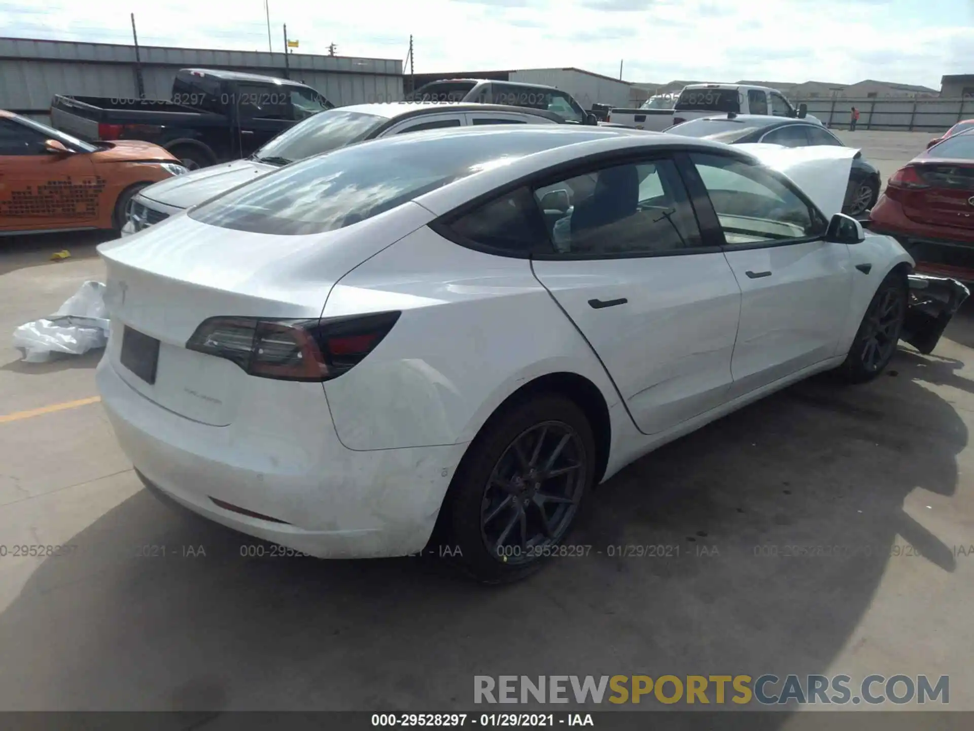 4 Photograph of a damaged car 5YJ3E1EB5MF852883 TESLA MODEL 3 2021