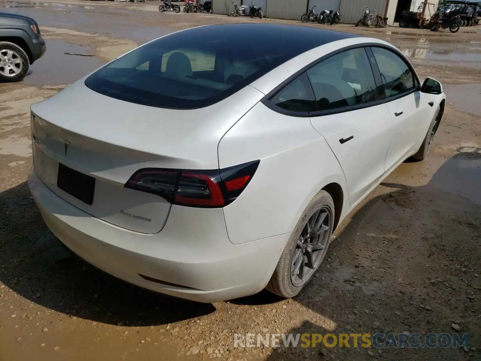 4 Photograph of a damaged car 5YJ3E1EB5MF858621 TESLA MODEL 3 2021