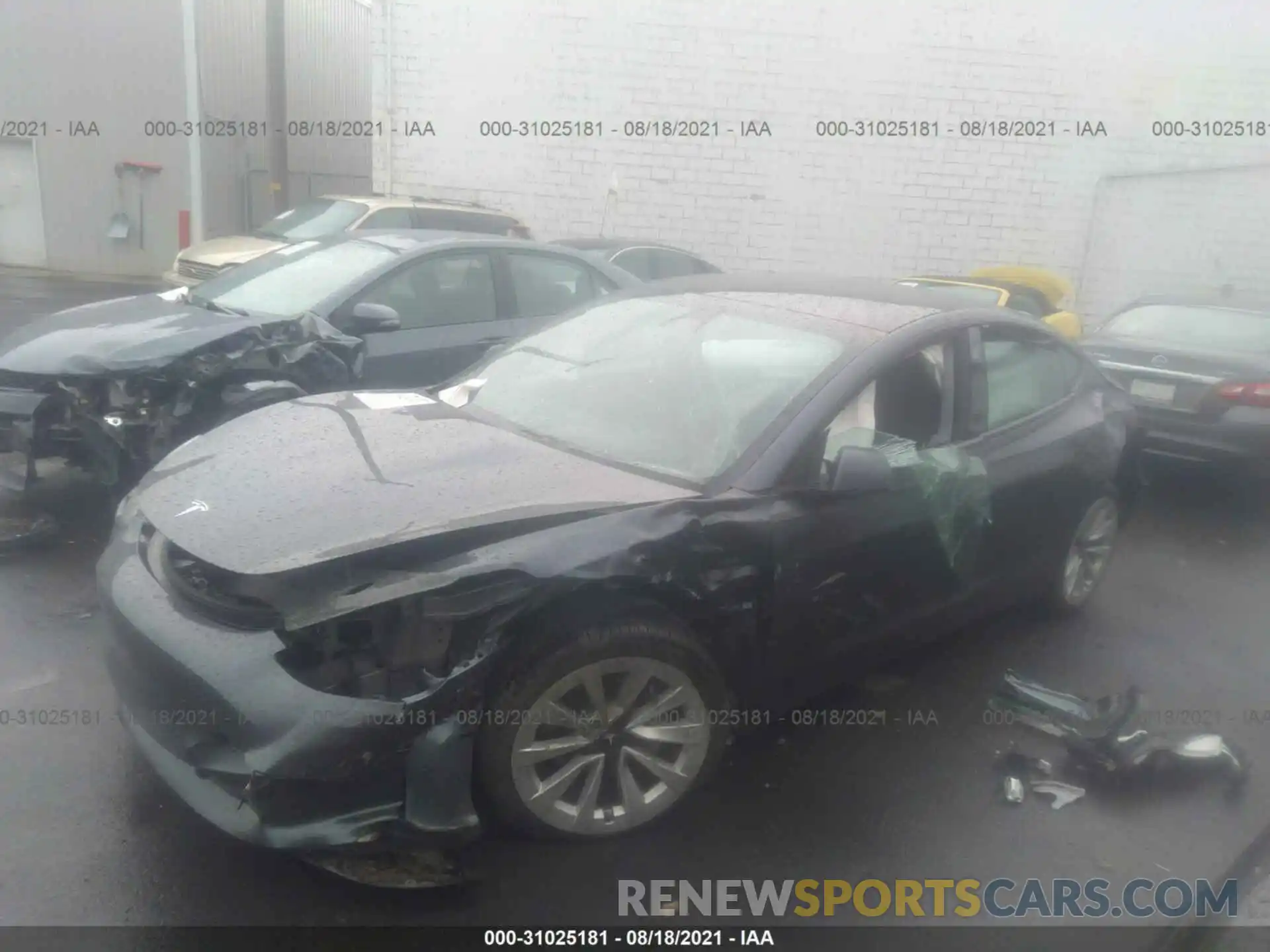 2 Photograph of a damaged car 5YJ3E1EB5MF862975 TESLA MODEL 3 2021