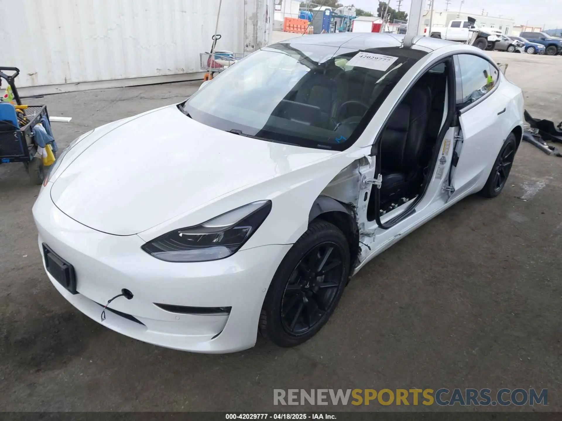 2 Photograph of a damaged car 5YJ3E1EB5MF872874 TESLA MODEL 3 2021