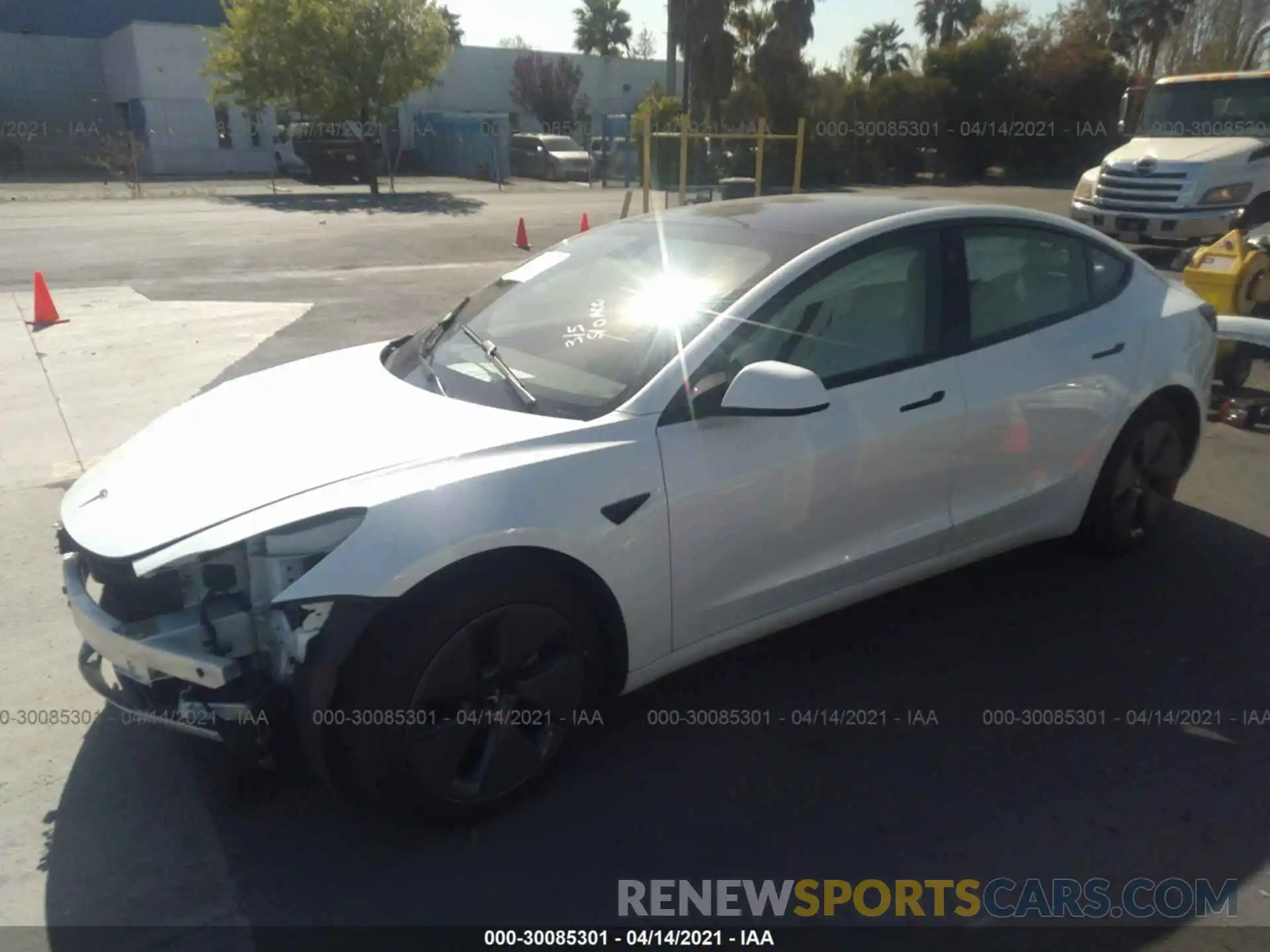 2 Photograph of a damaged car 5YJ3E1EB5MF876181 TESLA MODEL 3 2021