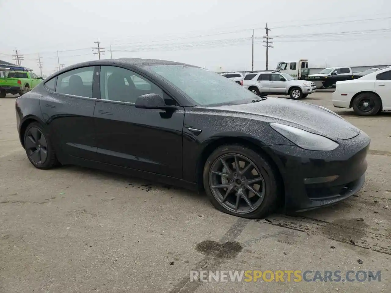 4 Photograph of a damaged car 5YJ3E1EB5MF974837 TESLA MODEL 3 2021