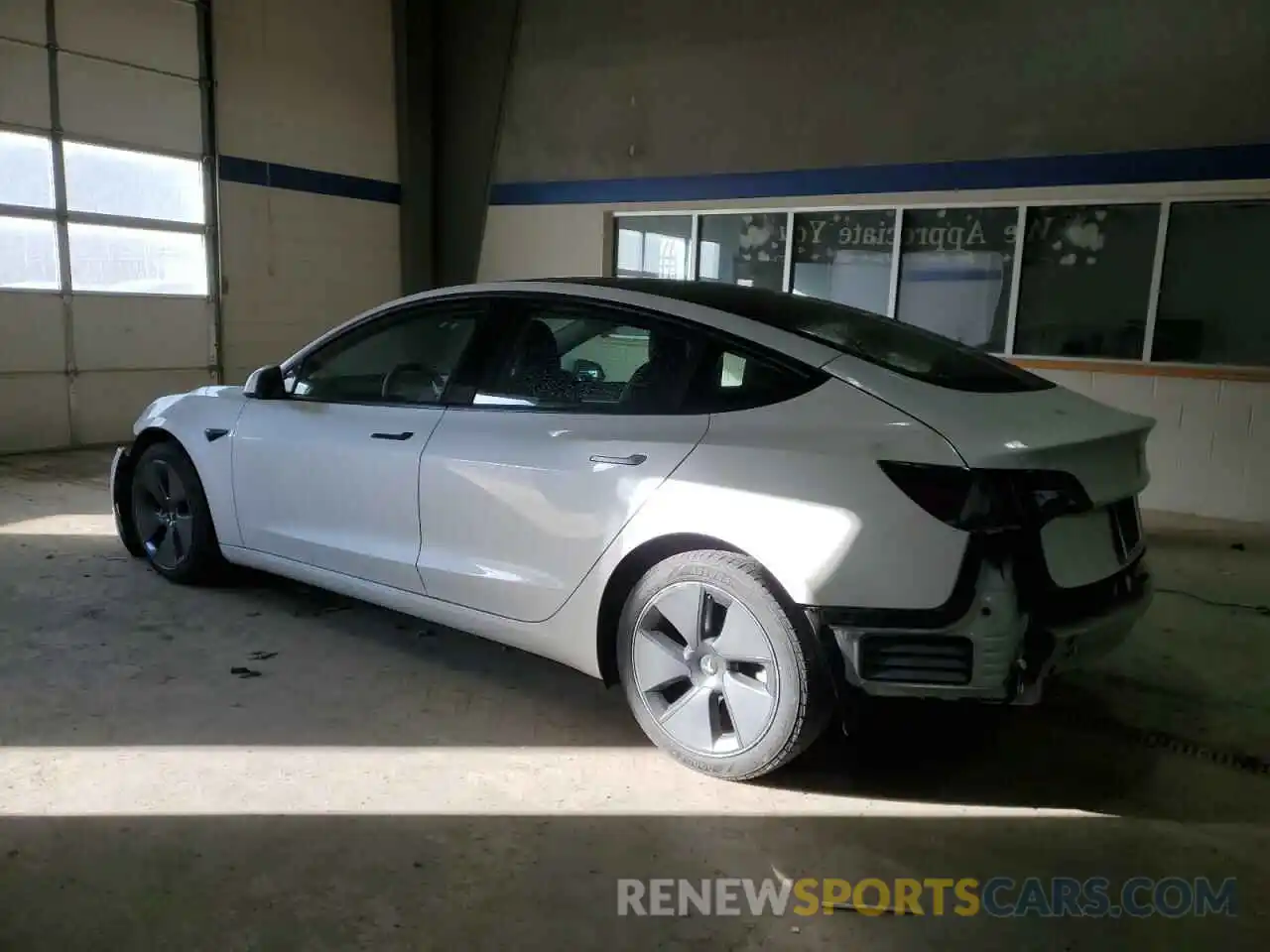 2 Photograph of a damaged car 5YJ3E1EB5MF980055 TESLA MODEL 3 2021