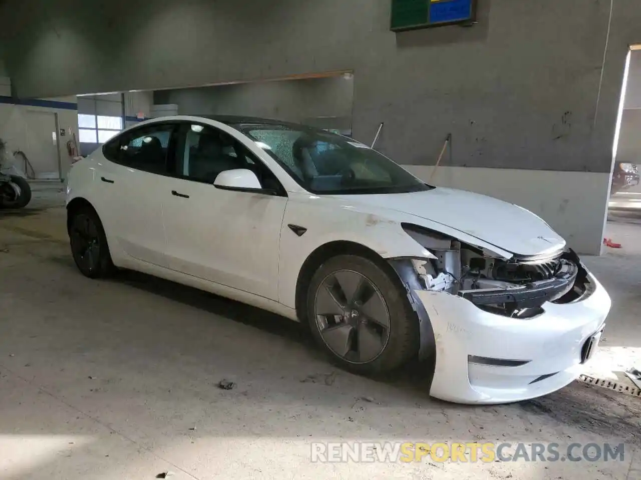 4 Photograph of a damaged car 5YJ3E1EB5MF980055 TESLA MODEL 3 2021