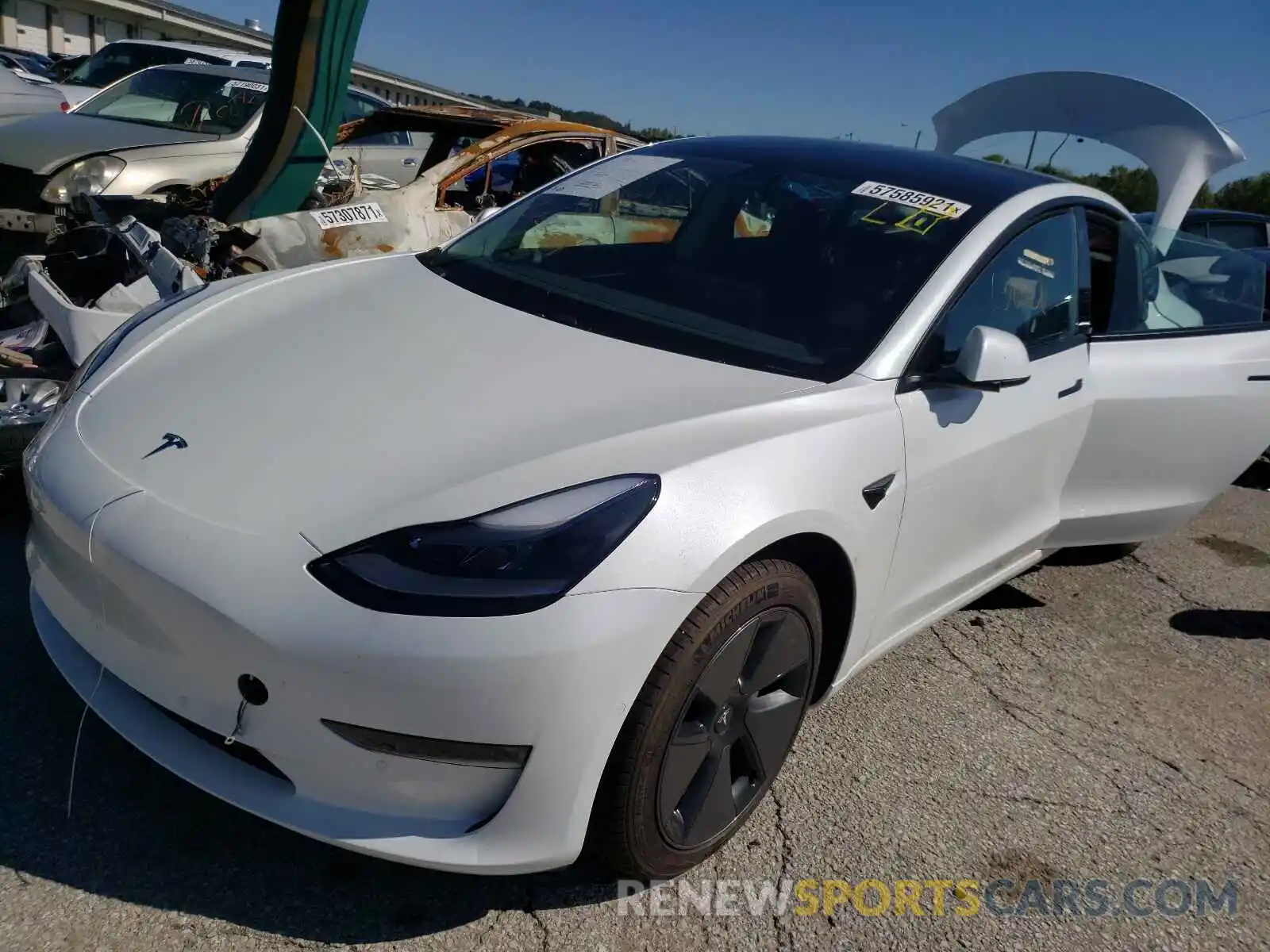 2 Photograph of a damaged car 5YJ3E1EB5MF992755 TESLA MODEL 3 2021