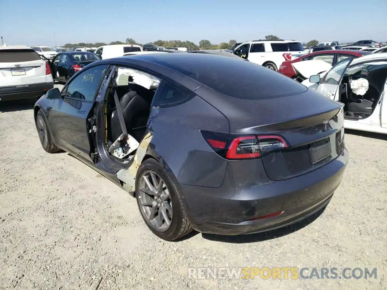 3 Photograph of a damaged car 5YJ3E1EB5MF999043 TESLA MODEL 3 2021