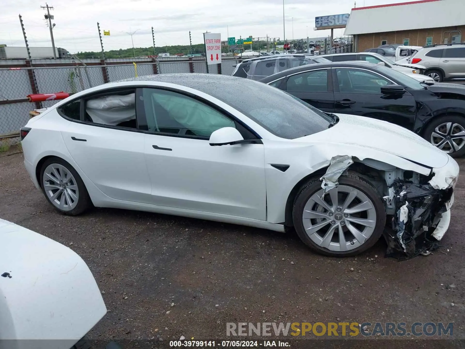 12 Photograph of a damaged car 5YJ3E1EB6MF048950 TESLA MODEL 3 2021