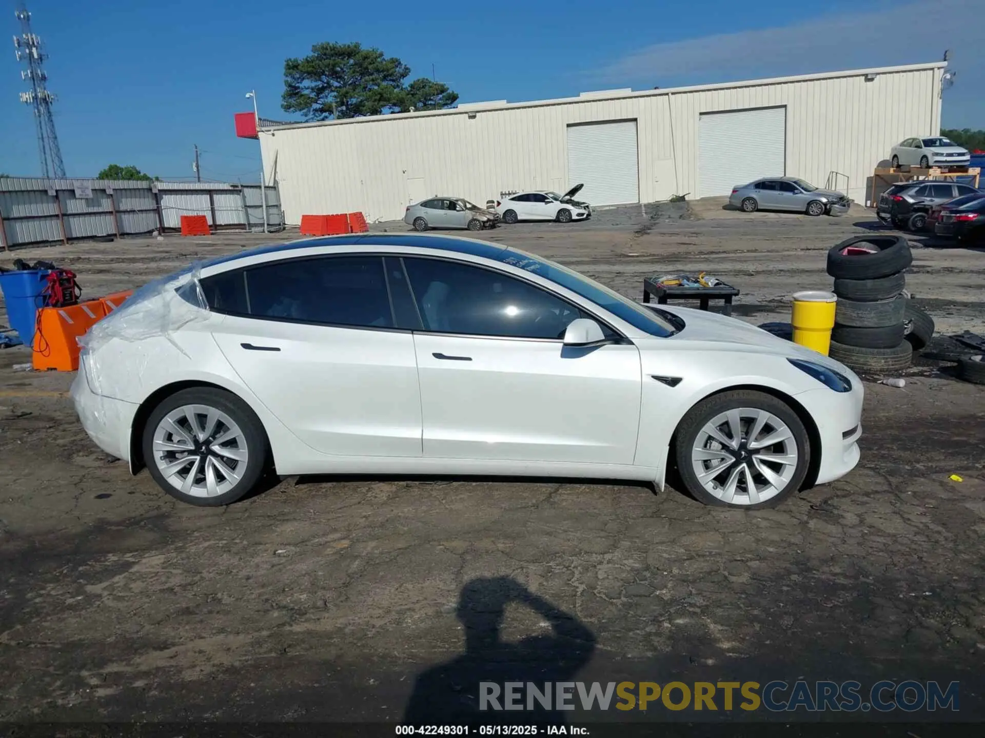 12 Photograph of a damaged car 5YJ3E1EB6MF053498 TESLA MODEL 3 2021
