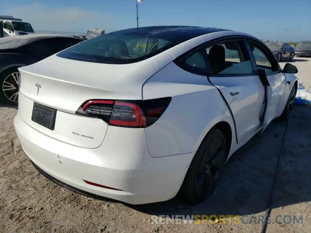 4 Photograph of a damaged car 5YJ3E1EB6MF859129 TESLA MODEL 3 2021