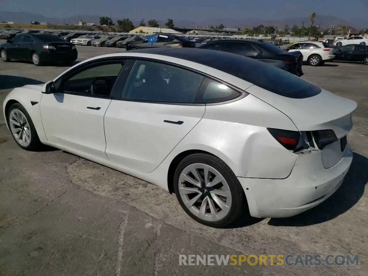 2 Photograph of a damaged car 5YJ3E1EB6MF877453 TESLA MODEL 3 2021