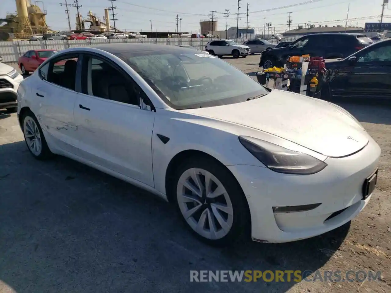 4 Photograph of a damaged car 5YJ3E1EB6MF877453 TESLA MODEL 3 2021