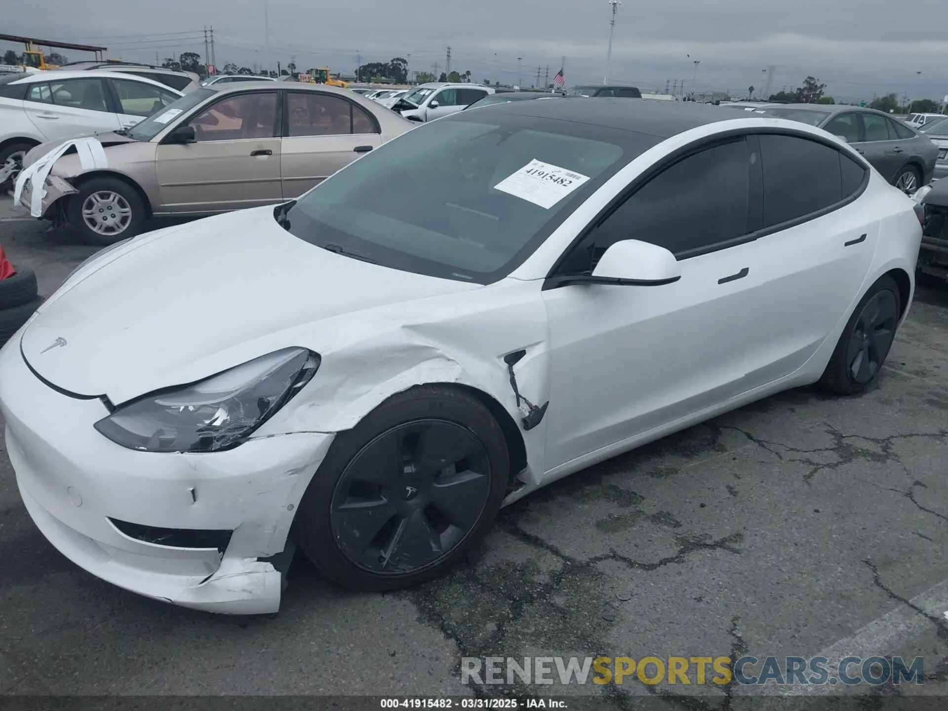 2 Photograph of a damaged car 5YJ3E1EB6MF878957 TESLA MODEL 3 2021