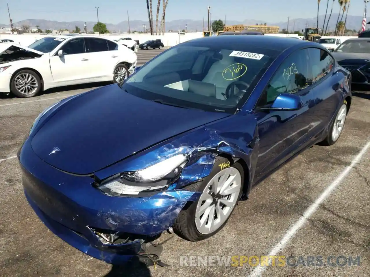 2 Photograph of a damaged car 5YJ3E1EB6MF903260 TESLA MODEL 3 2021