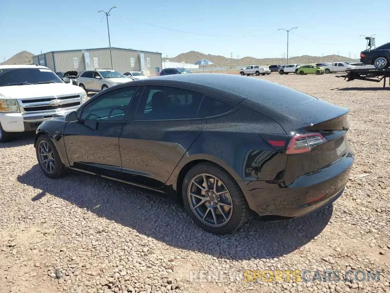 2 Photograph of a damaged car 5YJ3E1EB6MF915604 TESLA MODEL 3 2021