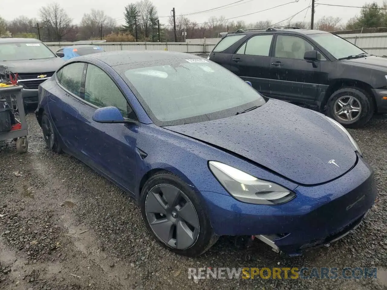 4 Photograph of a damaged car 5YJ3E1EB6MF923931 TESLA MODEL 3 2021
