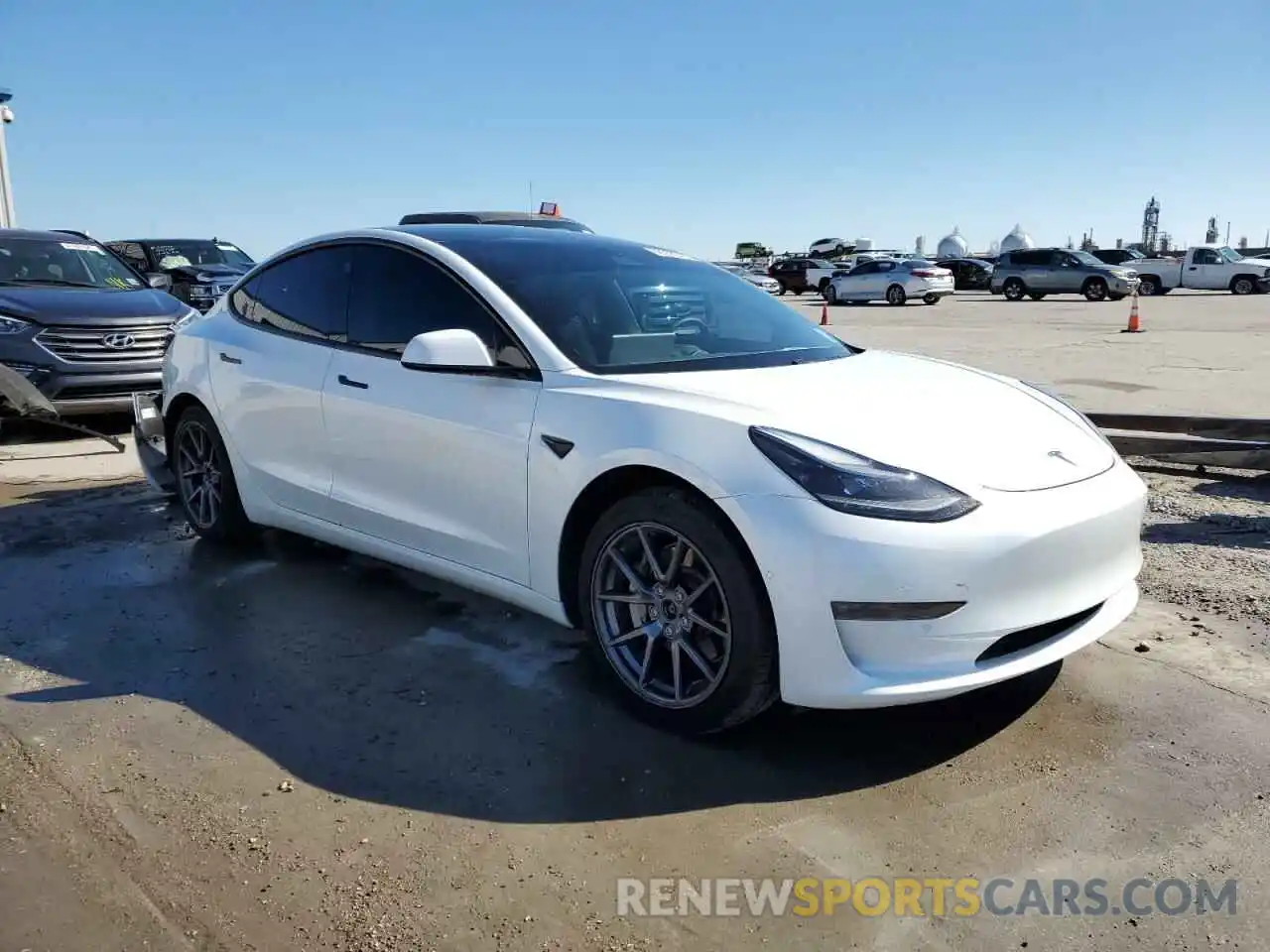 4 Photograph of a damaged car 5YJ3E1EB6MF979027 TESLA MODEL 3 2021