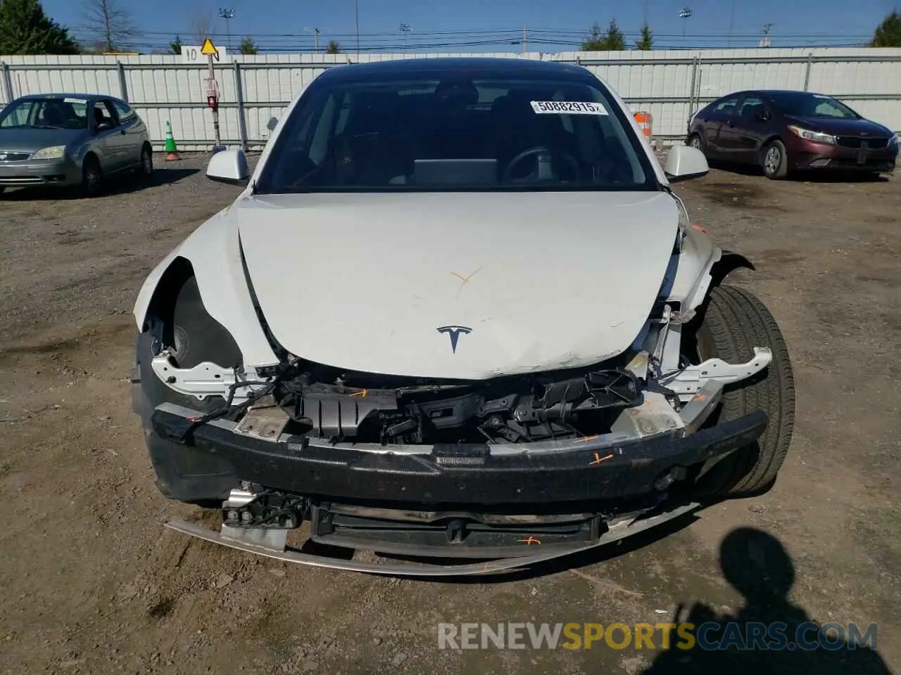 5 Photograph of a damaged car 5YJ3E1EB6MF980503 TESLA MODEL 3 2021