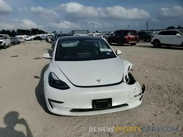 10 Photograph of a damaged car 5YJ3E1EB6MF988326 TESLA MODEL 3 2021