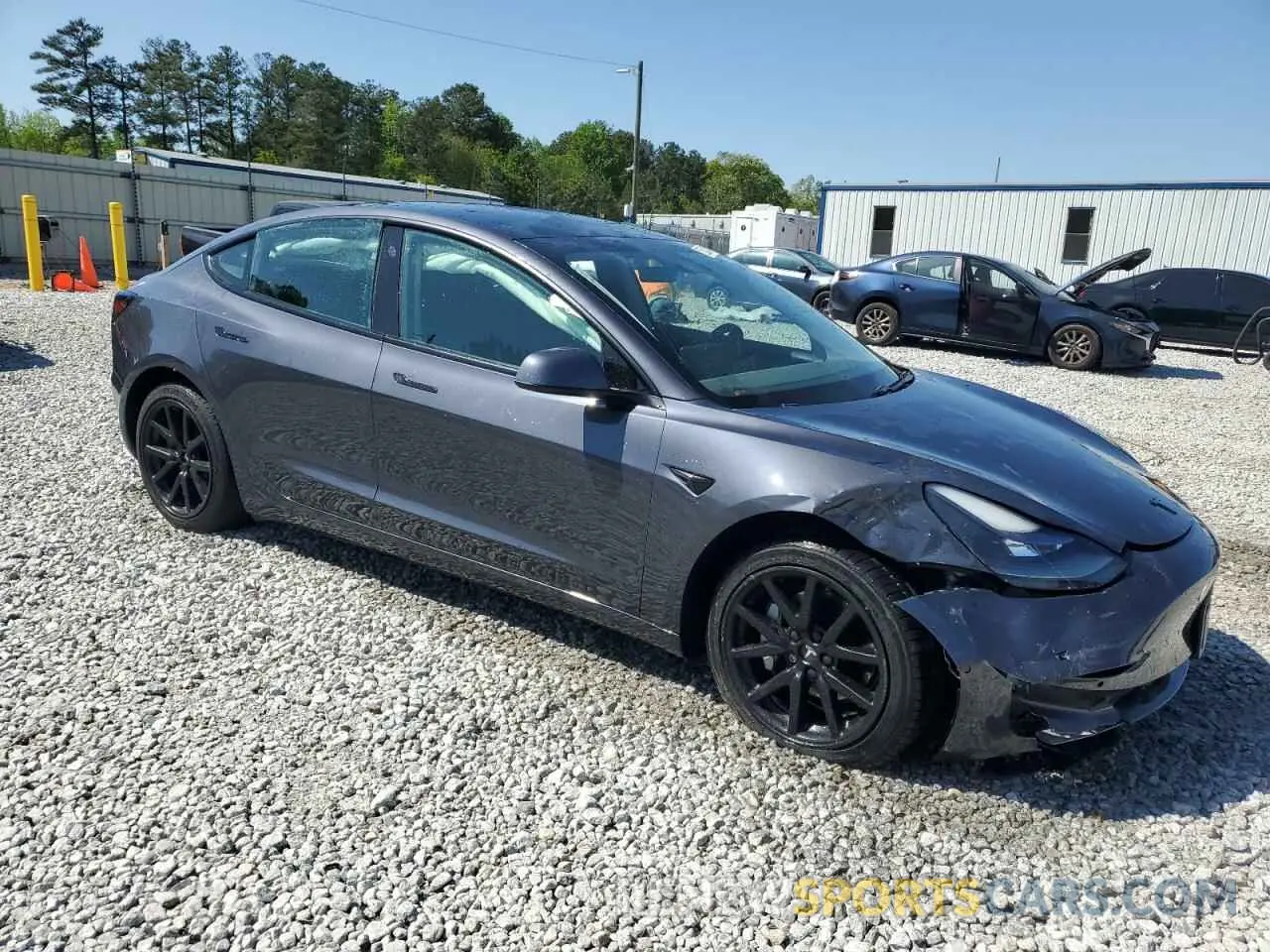 4 Photograph of a damaged car 5YJ3E1EB7MF014824 TESLA MODEL 3 2021