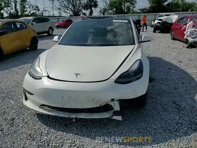 14 Photograph of a damaged car 5YJ3E1EB7MF049668 TESLA MODEL 3 2021