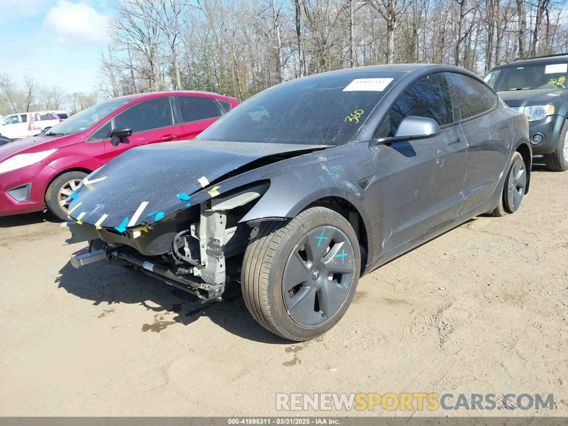 2 Photograph of a damaged car 5YJ3E1EB7MF050917 TESLA MODEL 3 2021