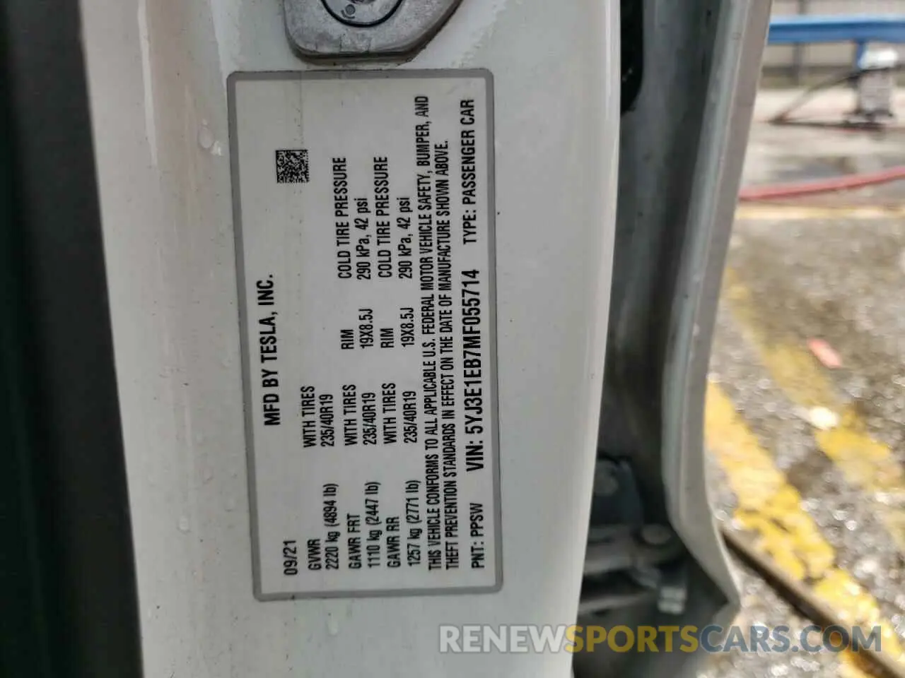 12 Photograph of a damaged car 5YJ3E1EB7MF055714 TESLA MODEL 3 2021