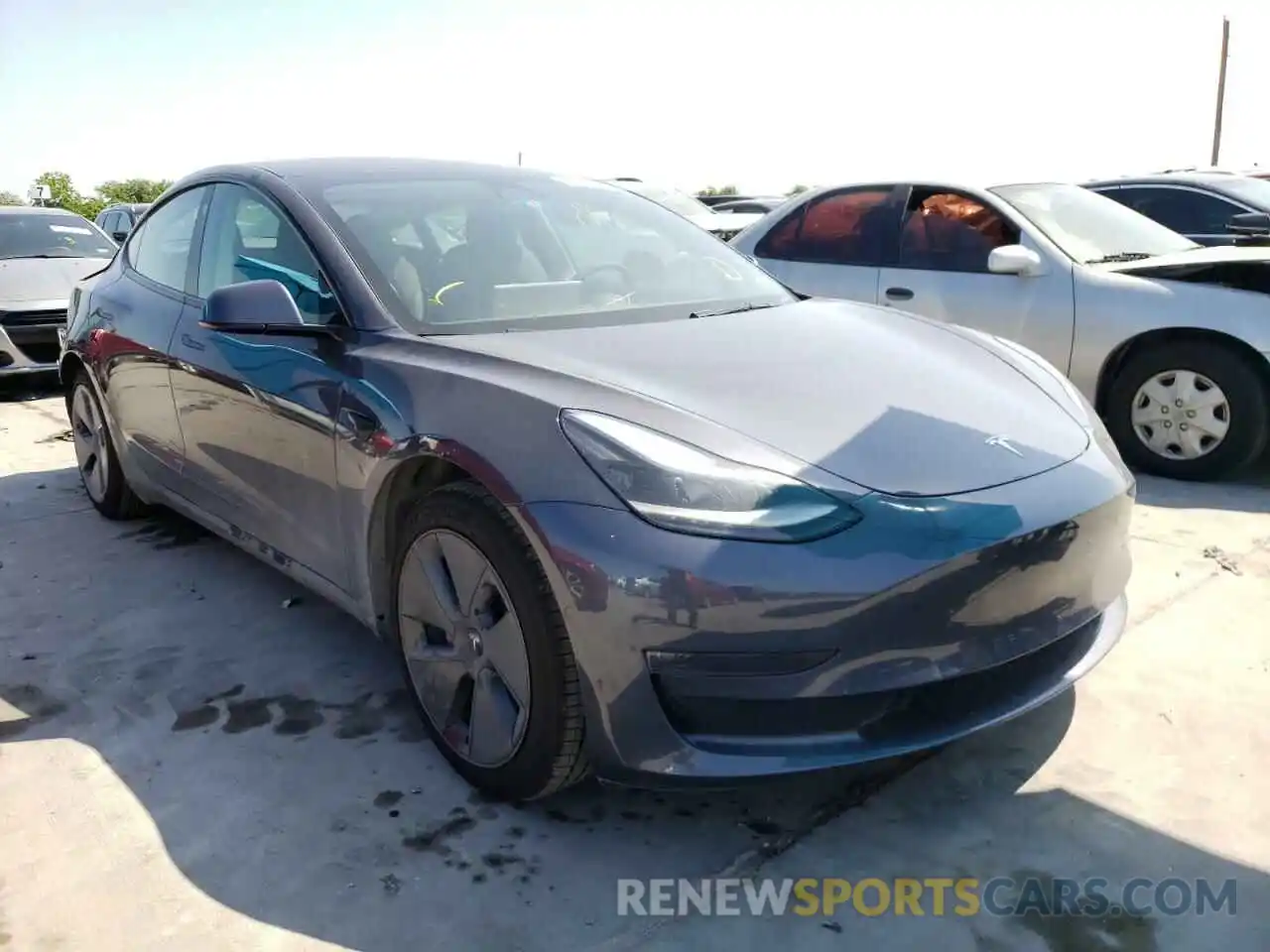 1 Photograph of a damaged car 5YJ3E1EB7MF097199 TESLA MODEL 3 2021