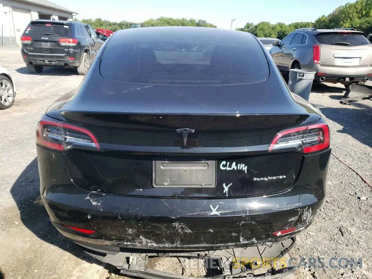 6 Photograph of a damaged car 5YJ3E1EB7MF858748 TESLA MODEL 3 2021
