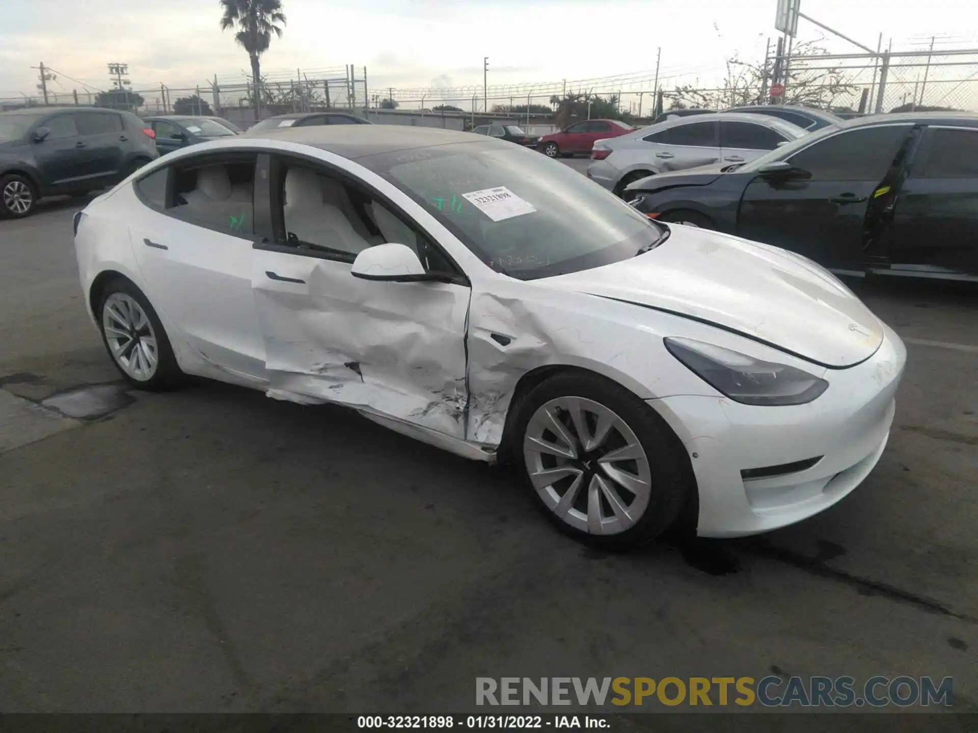 1 Photograph of a damaged car 5YJ3E1EB7MF868910 TESLA MODEL 3 2021