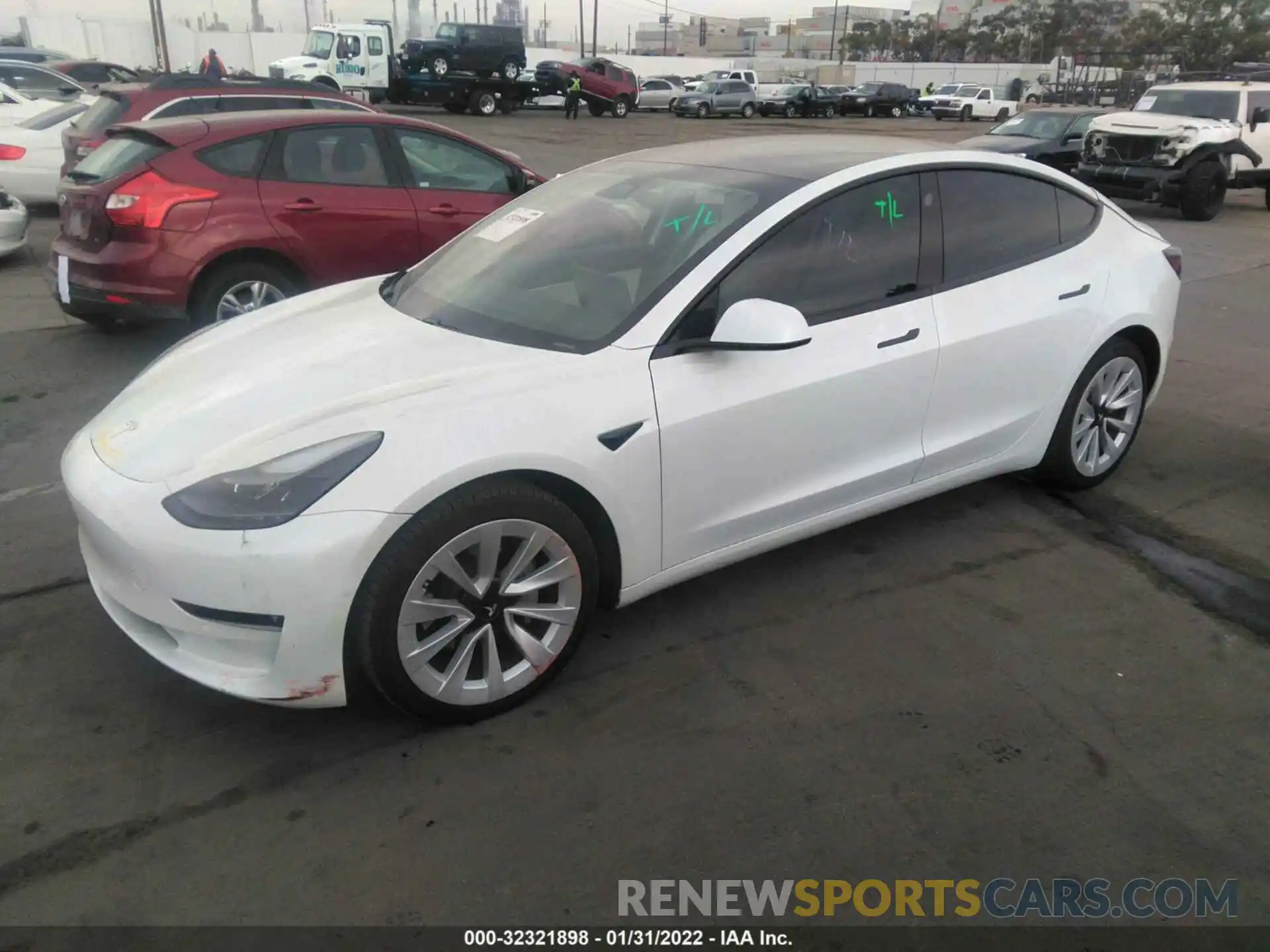 2 Photograph of a damaged car 5YJ3E1EB7MF868910 TESLA MODEL 3 2021