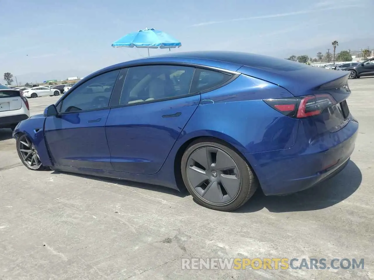 2 Photograph of a damaged car 5YJ3E1EB7MF878885 TESLA MODEL 3 2021