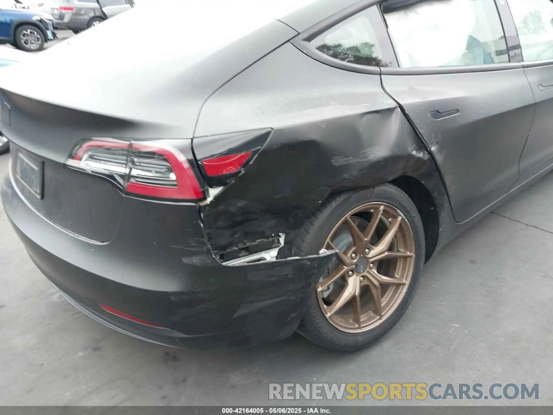 12 Photograph of a damaged car 5YJ3E1EB7MF879745 TESLA MODEL 3 2021