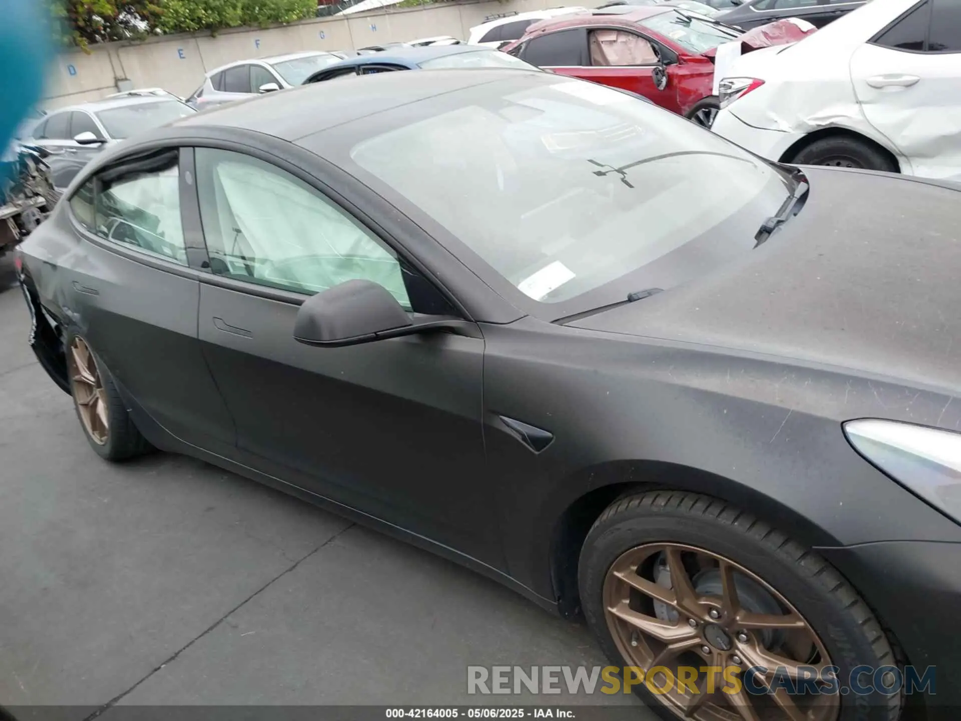 14 Photograph of a damaged car 5YJ3E1EB7MF879745 TESLA MODEL 3 2021