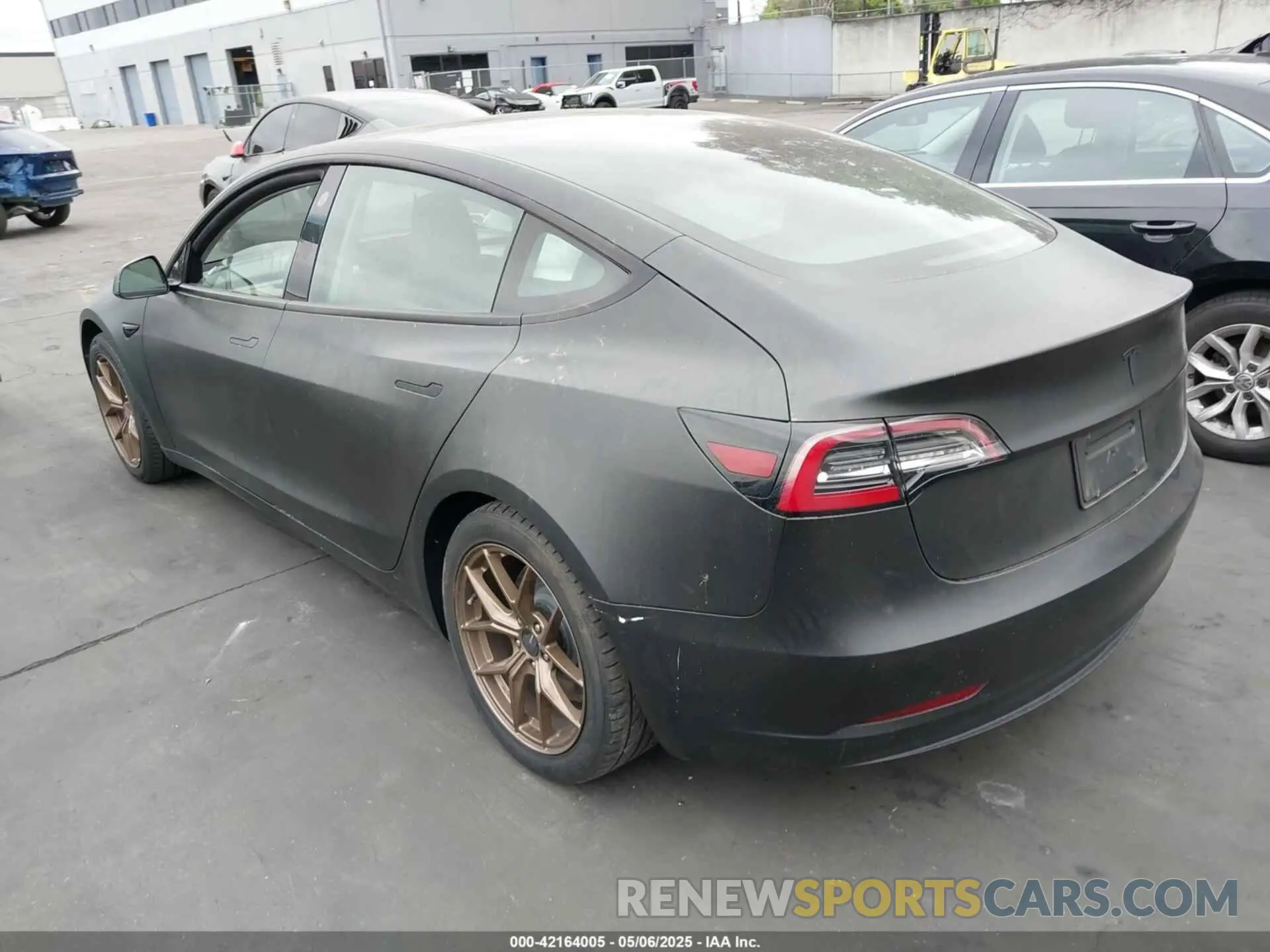 3 Photograph of a damaged car 5YJ3E1EB7MF879745 TESLA MODEL 3 2021