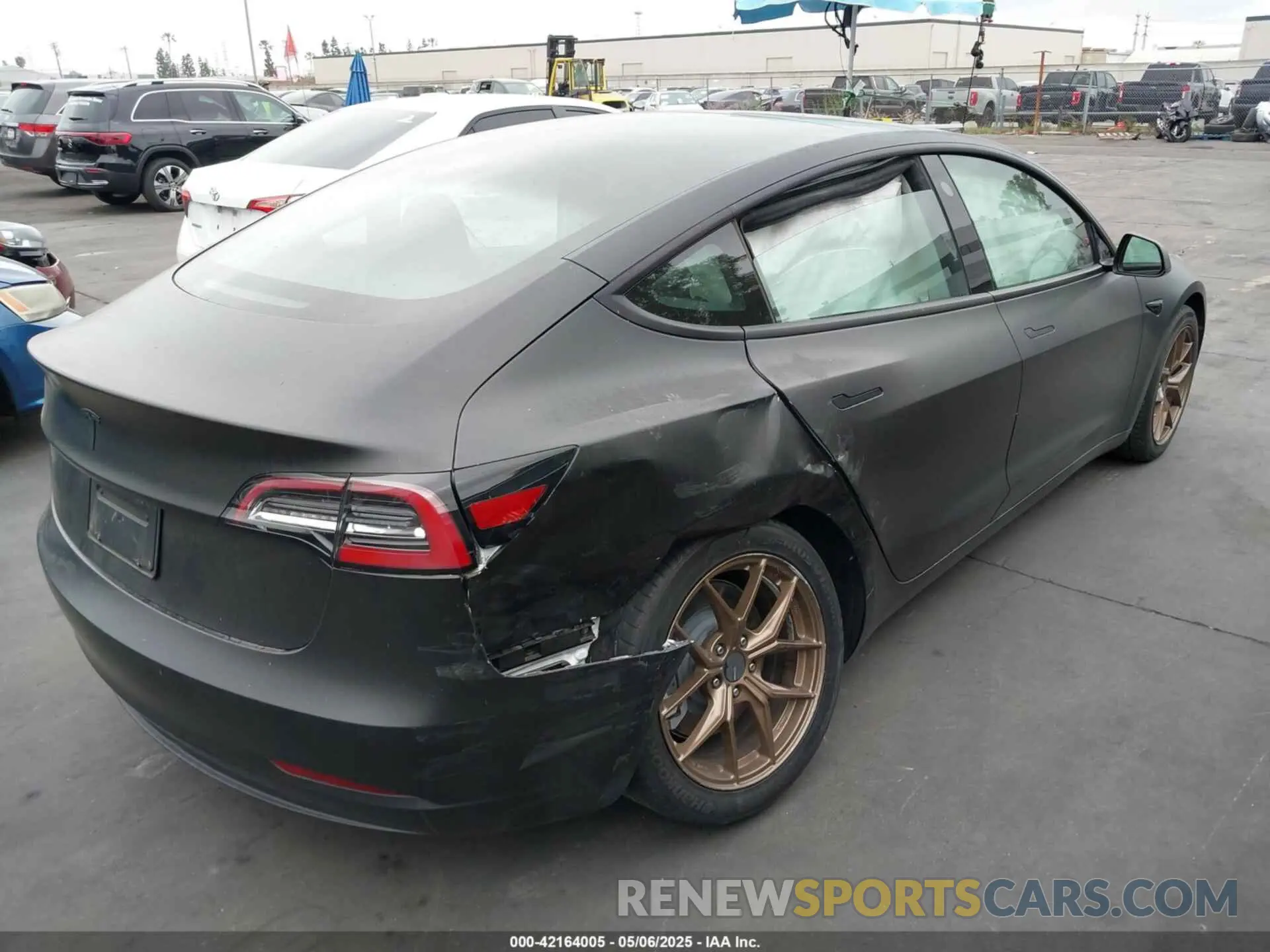 4 Photograph of a damaged car 5YJ3E1EB7MF879745 TESLA MODEL 3 2021