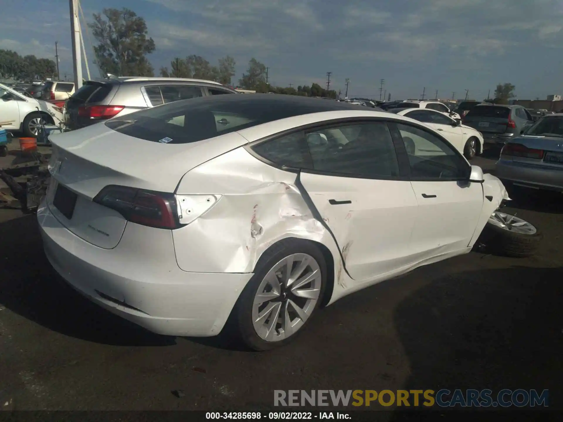 4 Photograph of a damaged car 5YJ3E1EB7MF936817 TESLA MODEL 3 2021